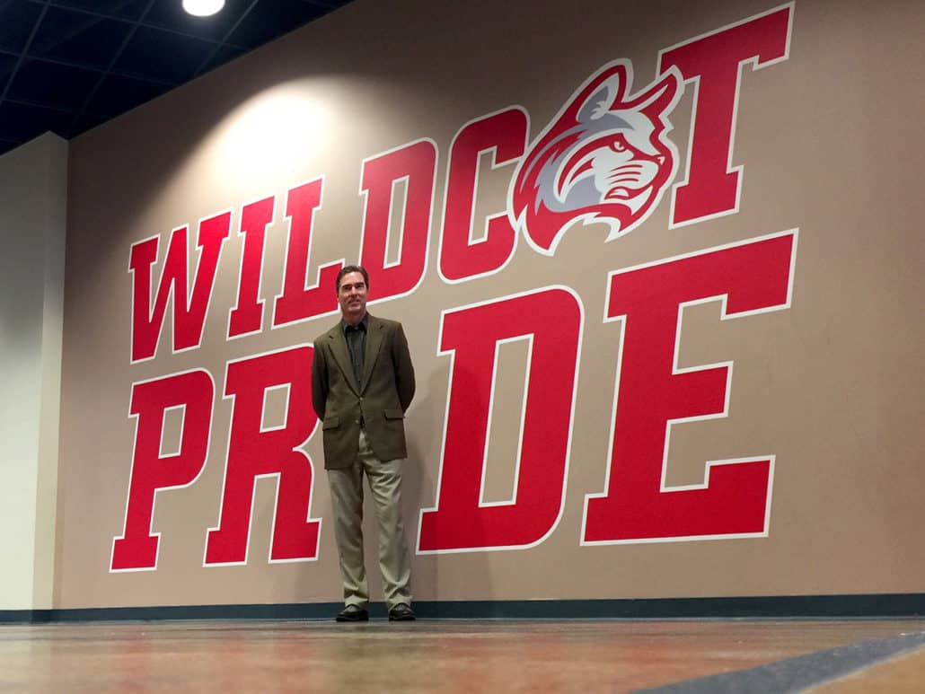Bold red "WILDCATS PRIDE" sign with cat mascot logo at Signworks.