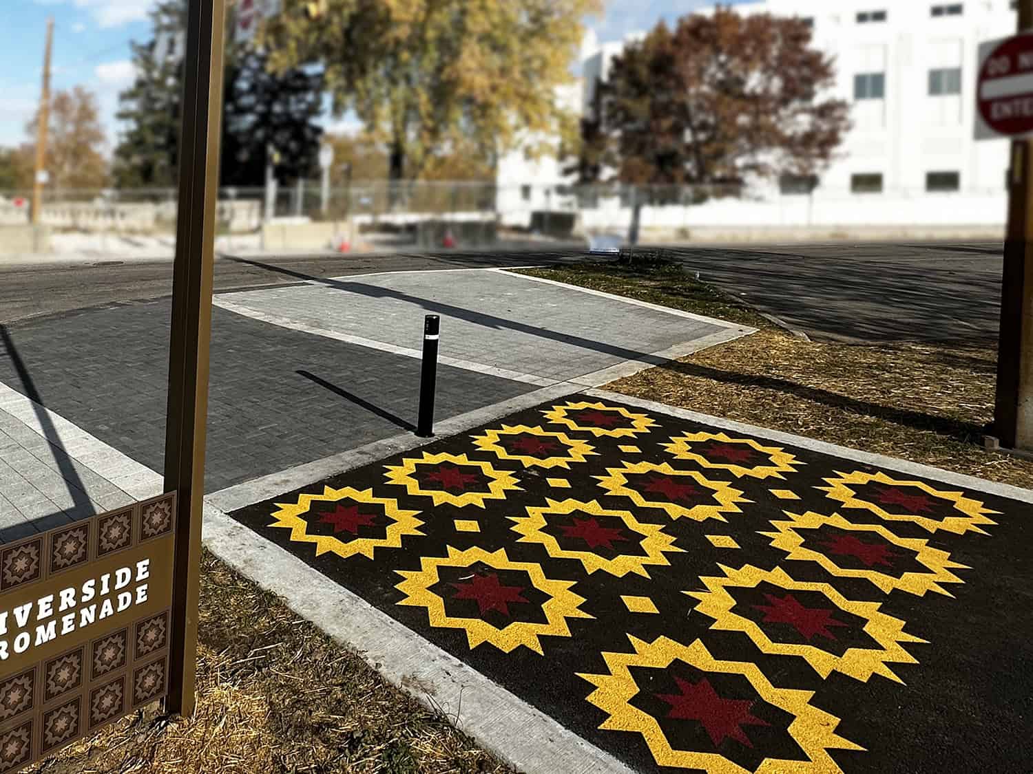 artistic walkway with bright blue and yellow motifs